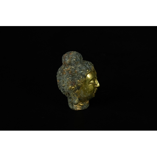 346 - A Chinese Tibetan Gilded Bronze Buddha Head, 19th Century or Later. - A fragmented head, likely repr... 