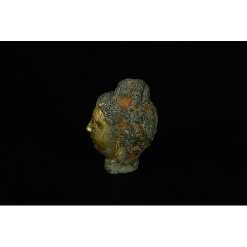 346 - A Chinese Tibetan Gilded Bronze Buddha Head, 19th Century or Later. - A fragmented head, likely repr... 