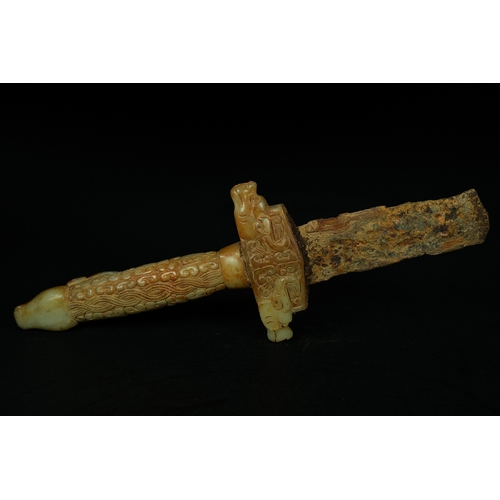 348 - A Chinese Jade Ritual Sword with Carved Zoomorphic Motifs, Warring States. - A Chinese ritual sword ... 