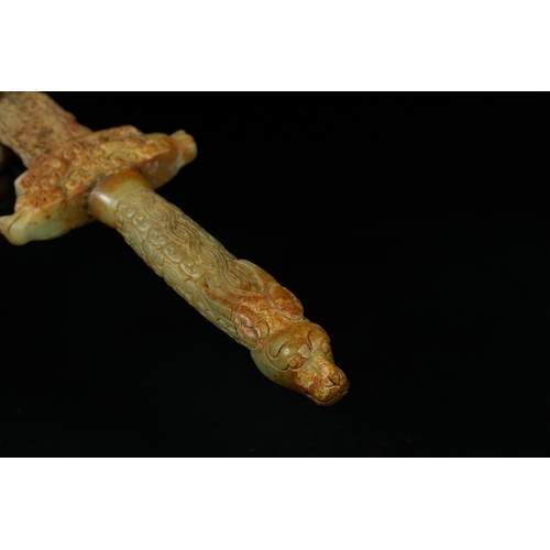 348 - A Chinese Jade Ritual Sword with Carved Zoomorphic Motifs, Warring States. - A Chinese ritual sword ... 