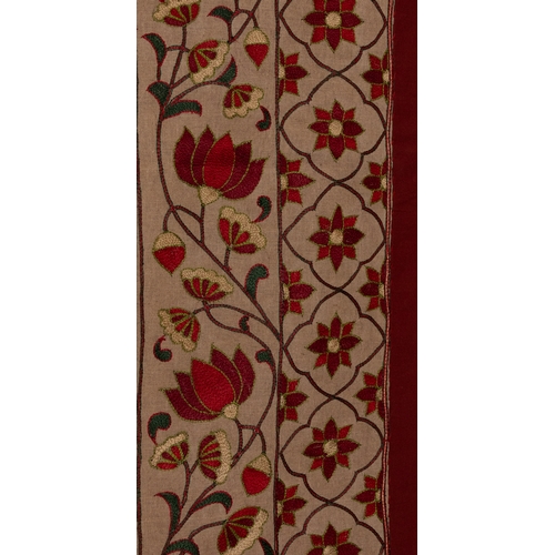 75 - An Indian Floral Prayer Mat with Stylised Vase and Tulip Design.

A finely woven Indian prayer mat f... 