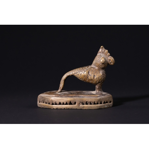79 - An Indian Bronze Figural Foot Scraper in the Form of a Cockerel, 19th- 20th Century.

An Indian cast... 