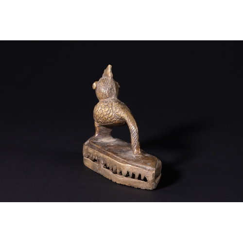 79 - An Indian Bronze Figural Foot Scraper in the Form of a Cockerel, 19th- 20th Century.

An Indian cast... 
