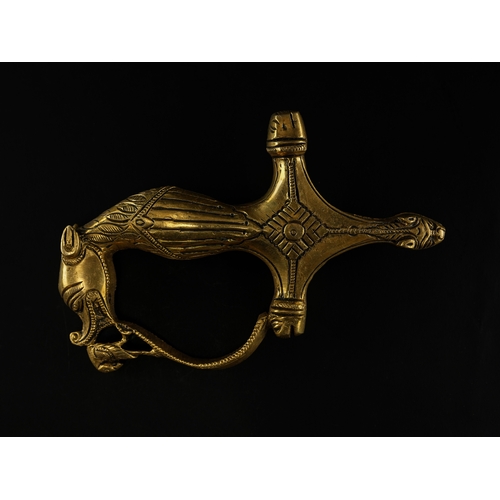 83 - An Indian Tipu Sultan Style Brass Hilt, 18th–19th Century.

An Indian brass sword hilt cast in the d... 
