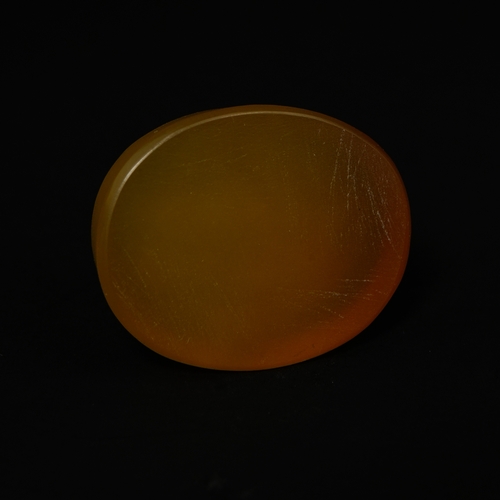 202 - An Islamic Carved Carnelian Agate Seal Stone with Arabic Calligraphy.

An oval Islamic seal carved f... 
