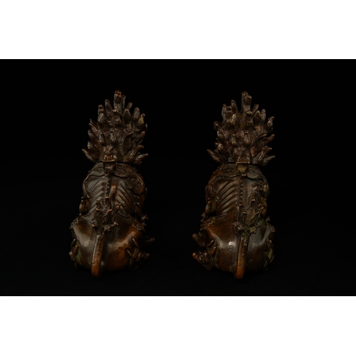 382 - A Pair of Chinese Bronze Guardian Lions (Foo Dogs).

A finely cast pair of Chinese bronze guardian l... 