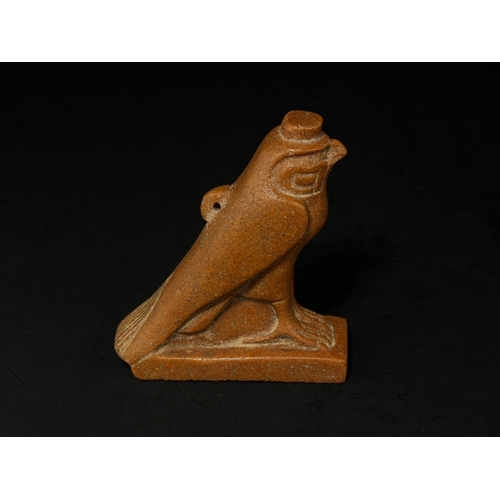 12 - An Egyptian Stone Figure of Horus as a Falcon, Late Period–Ptolemaic Period Circa 664–30 B.C..

Carv... 