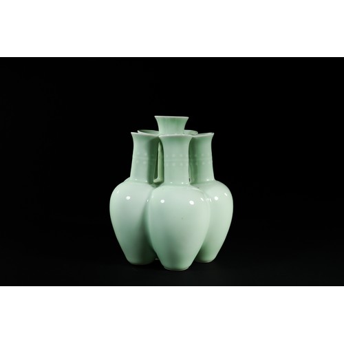 329 - A Chinese Celadon-Glazed Six-Neck Vase, Qianlong Mark.

A pale celadon-glazed vase formed as six joi... 