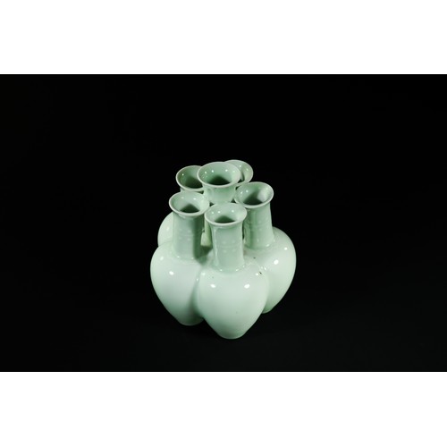329 - A Chinese Celadon-Glazed Six-Neck Vase, Qianlong Mark.

A pale celadon-glazed vase formed as six joi... 