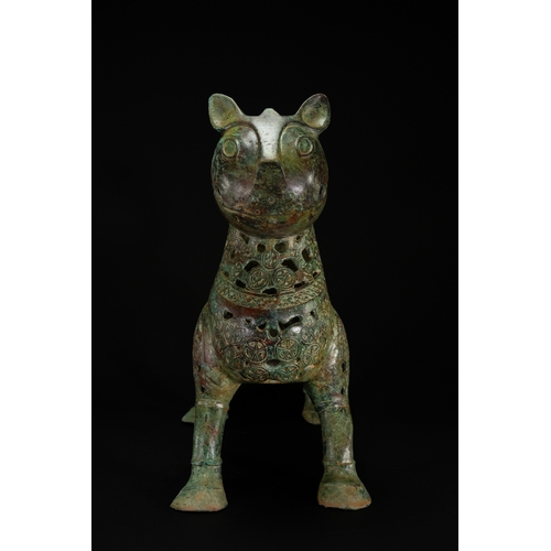 10 - A Khorassan Style Openwork Bronze Zoomorphic Figure.

The figure is cast in bronze, modelled as a st... 