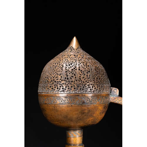 11 - An Ottoman Pierced Copper Censer with Engraved Floral Decoration, 19th Century.

An Ottoman copper c... 