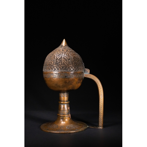 11 - An Ottoman Pierced Copper Censer with Engraved Floral Decoration, 19th Century.

An Ottoman copper c... 