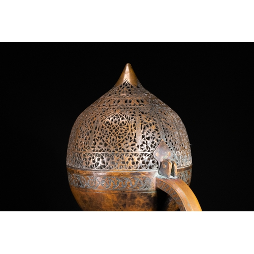 11 - An Ottoman Pierced Copper Censer with Engraved Floral Decoration, 19th Century.

An Ottoman copper c... 