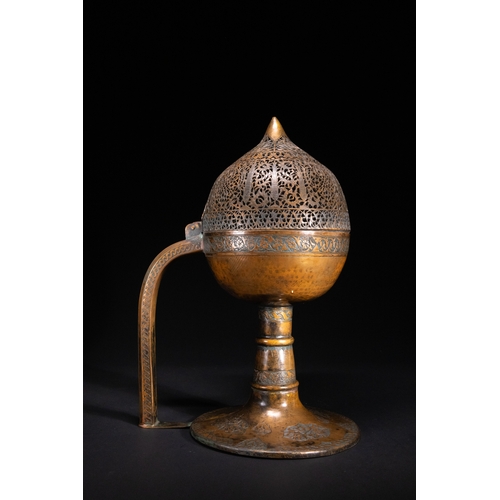 11 - An Ottoman Pierced Copper Censer with Engraved Floral Decoration, 19th Century.

An Ottoman copper c... 