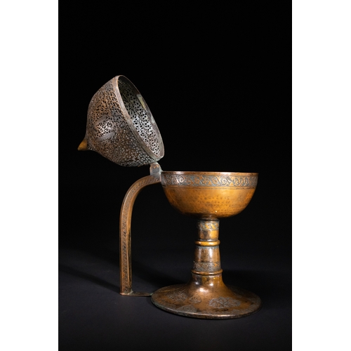 11 - An Ottoman Pierced Copper Censer with Engraved Floral Decoration, 19th Century.

An Ottoman copper c... 