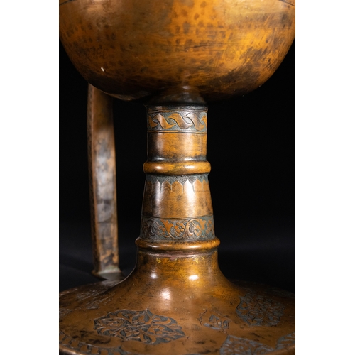 11 - An Ottoman Pierced Copper Censer with Engraved Floral Decoration, 19th Century.

An Ottoman copper c... 