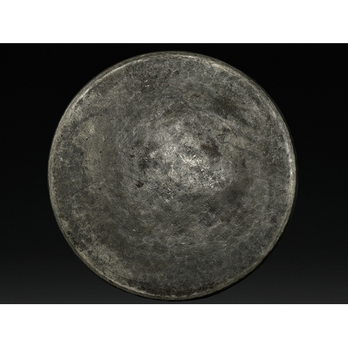 18 - Mohammad Yazdi: A Safavid Copper Tray with Calligraphic and Floral Decoration, 17th Century.

Of cir... 