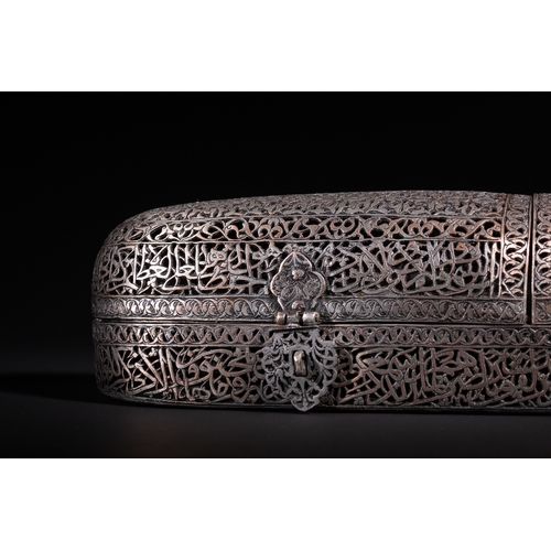 13 - A Safavid Openwork Copper Qalamdan Pen Box with Qur’anic Inscriptions, 17th Century.

An elongated S... 