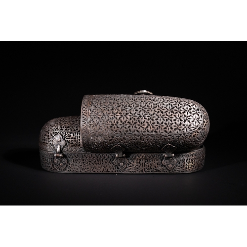 13 - A Safavid Openwork Copper Qalamdan Pen Box with Qur’anic Inscriptions, 17th Century.

An elongated S... 