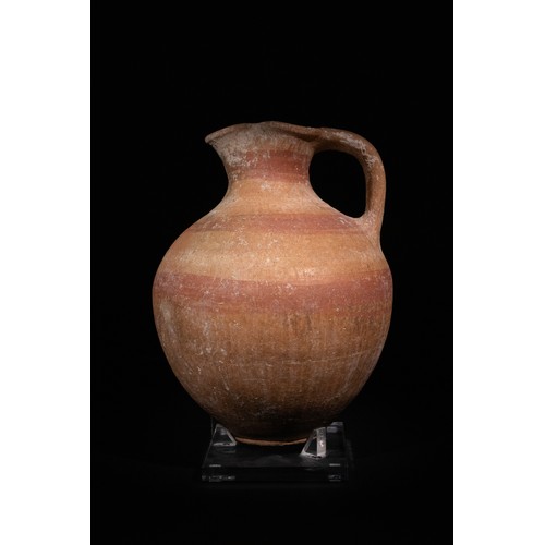 1 - An Eastern Greek Terracotta Jug, 4th-5th Century B.C., with Trefoil Shaped Sprout.

The jug is craft... 