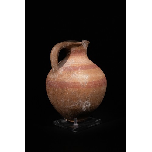 1 - An Eastern Greek Terracotta Jug, 4th-5th Century B.C., with Trefoil Shaped Sprout.

The jug is craft... 