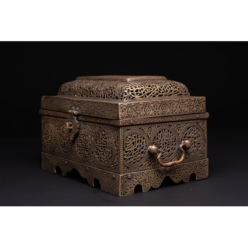 28 - A Qajar Brass Pierced and Engraved Lidded Qur'an Holder with Calligraphic Panels.

The box is of rec... 