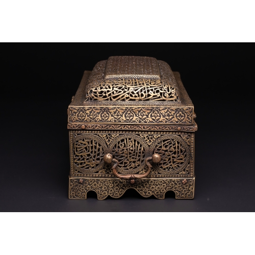 28 - A Qajar Brass Pierced and Engraved Lidded Qur'an Holder with Calligraphic Panels.

The box is of rec... 