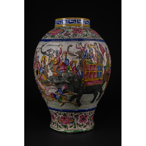 29 - A Large Qajar Polychrome Enamelled Pottery Vase, 19th Century.

Of baluster form with a slightly fla... 
