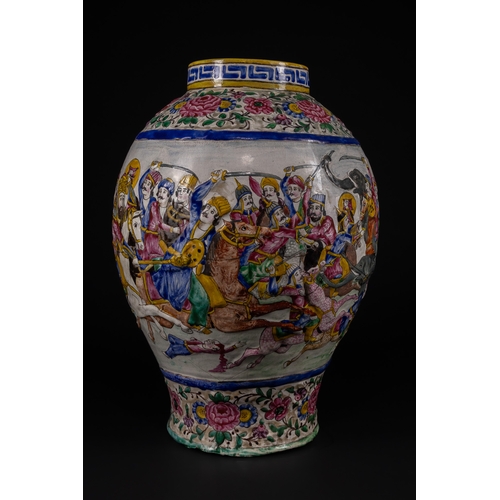 29 - A Large Qajar Polychrome Enamelled Pottery Vase, 19th Century.

Of baluster form with a slightly fla... 