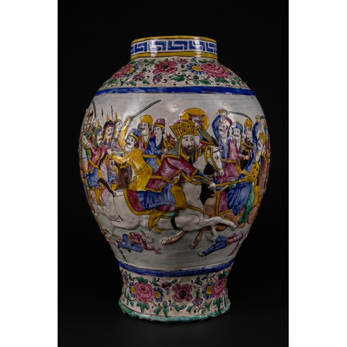 29 - A Large Qajar Polychrome Enamelled Pottery Vase, 19th Century.

Of baluster form with a slightly fla... 