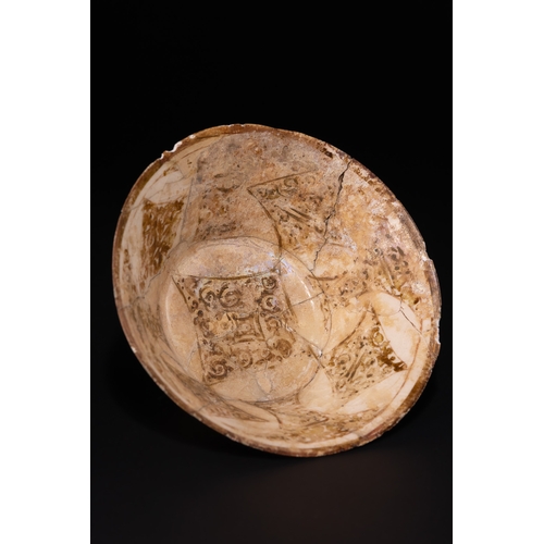 35 - An Islamic Kashan Pottery Bowl With Inscribed Rim, Probably 12th–13th Century.

Of deep conical form... 