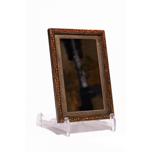 36 - A Qajar Lacquer Mirror Case with Figural and Floral Decoration, 19th-20th Century.

Of rectangular f... 