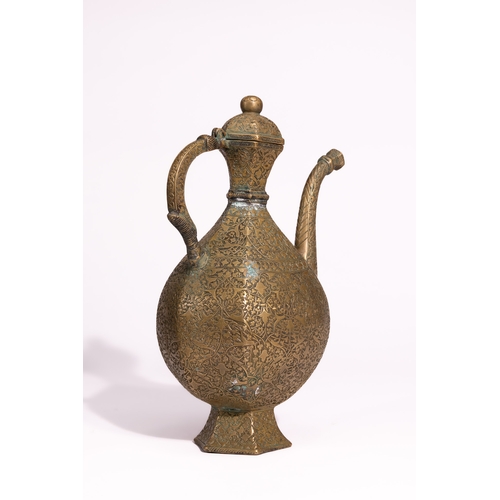 41 - A Persian Brass Ewer and Basin Set with Engraved Decoration.

The set comprises a ewer of bulbous fo... 
