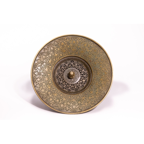 41 - A Persian Brass Ewer and Basin Set with Engraved Decoration.

The set comprises a ewer of bulbous fo... 