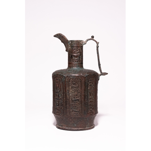 44 - An Islamic Bronze Faceted Ewer with Zoomorphic Panels, 12th Century.

A bronze ewer of faceted balus... 