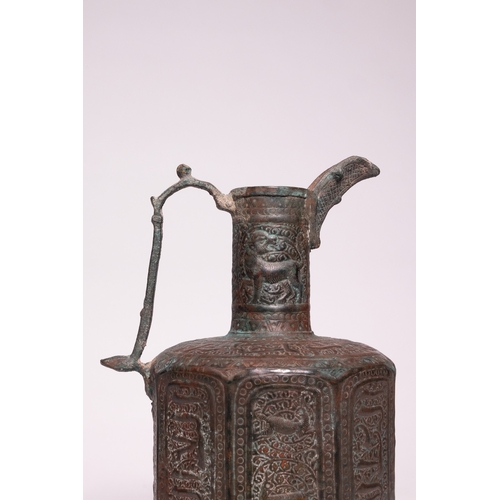 44 - An Islamic Bronze Faceted Ewer with Zoomorphic Panels, 12th Century.

A bronze ewer of faceted balus... 
