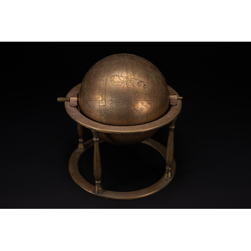 55 - An Islamic Brass Celestial Globe on Stand with Engraved Zodiac and Script.

An Islamic brass celesti... 