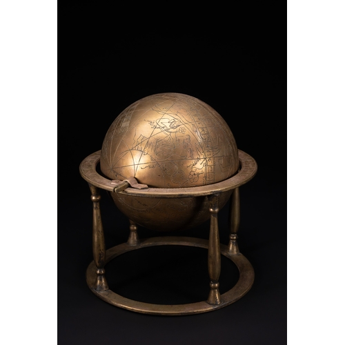 55 - An Islamic Brass Celestial Globe on Stand with Engraved Zodiac and Script.

An Islamic brass celesti... 