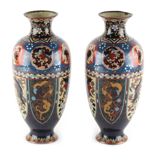 10 - A pair of Japanese cloisonne vases, circa 1900, decorated with phoenixes & dragons in panels, each 9... 