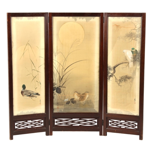 15 - Property of a lady - an early 20th century Japanese hardwood three panel screen with painted silk pa... 