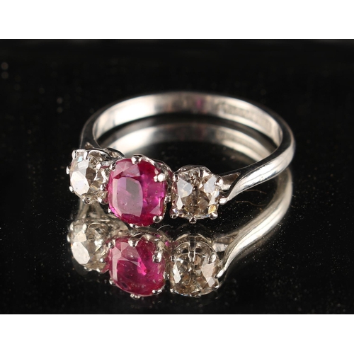 173 - A platinum ruby & diamond three stone ring, the certificated untreated Burmese cushion cut ruby weig... 