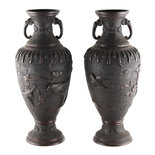 19 - Property of a gentleman - a pair of Japanese bronze two-handled baluster vases, Meiji period (1868-1... 