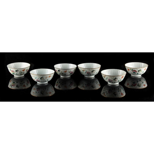 271 - A set of six early 20th century Chinese famille rose bowls, each painted with crickets & flowers, ir... 