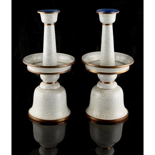 468 - Property of a lady - a pair of Chinese cloisonne temple candlesticks, early 20th century, with white... 