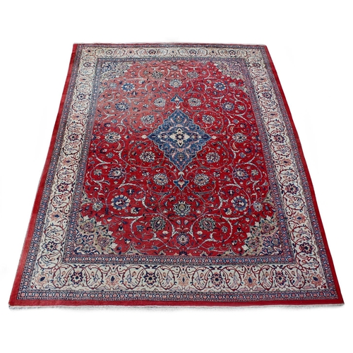 52 - Property of a gentleman - a Mahal carpet, with red ground, 156 by 120ins. (397 by 303cms.) (see illu... 