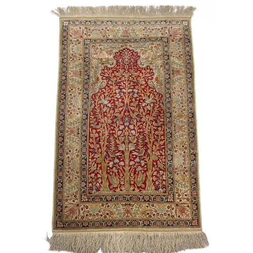 53 - Property of a gentleman - a Persian part silk 'Tree of Life' prayer rug, 56 by 36ins. (142 by 91cms.... 