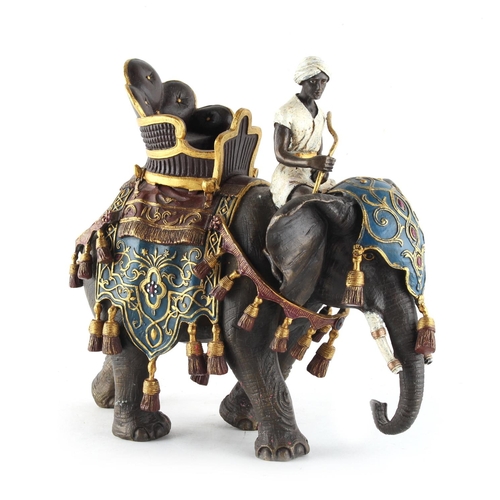 62 - Property of a lady - a cold painted bronze model of a caparisoned elephant with howdah & rider, 9ins... 