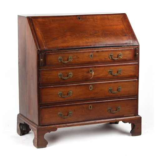 75 - Property of a lady - a George III oak & mahogany fall-front bureau, with four long graduated drawers... 