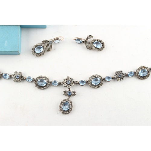 5 - Property of a lady - a blue & clear paste necklace with matching chandelier earrings (two 'stones' m... 