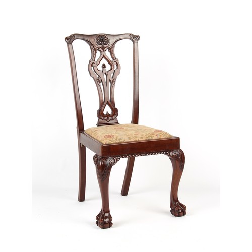 231 - A set of four Chippendale style carved side chairs, with drop-in seats (4).